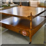 F55. Tiered coffee table with drawer. 